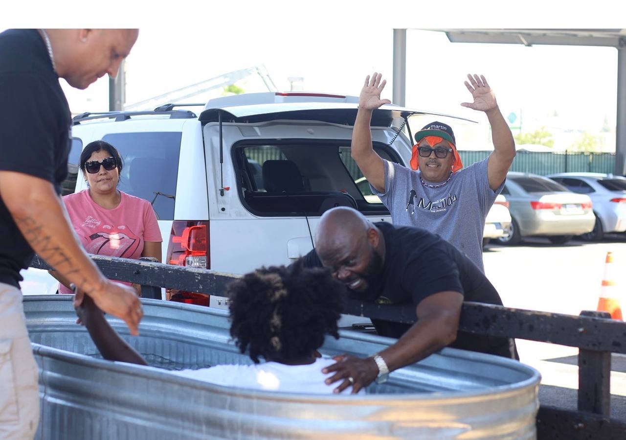 A water baptism at an outreach event